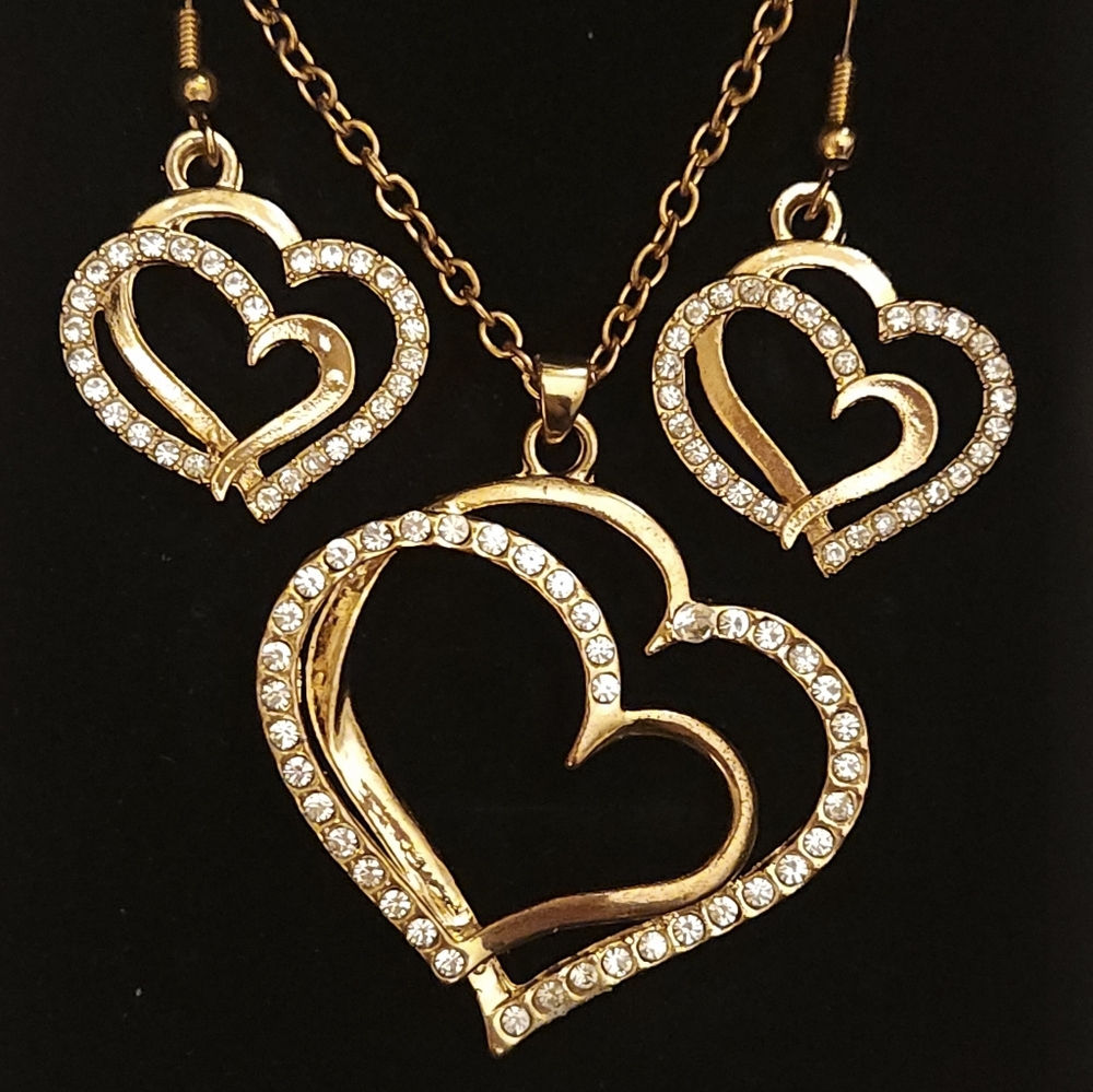 Gold And Crystal Heart Shaped Pendant And Earring Set